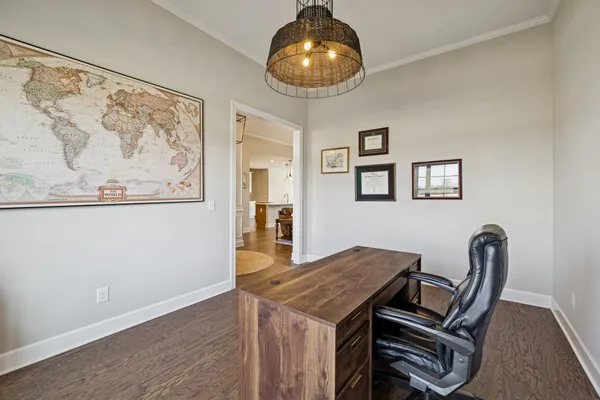 a kitchen with a stove a sink and a refrigerator