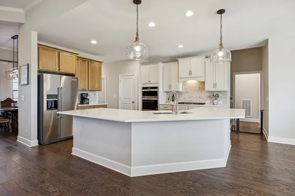 a bathroom with a sink and mirror