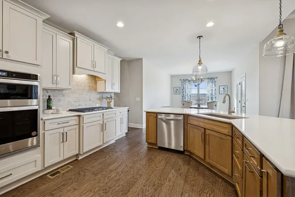 a bedroom with a bed and cabinets