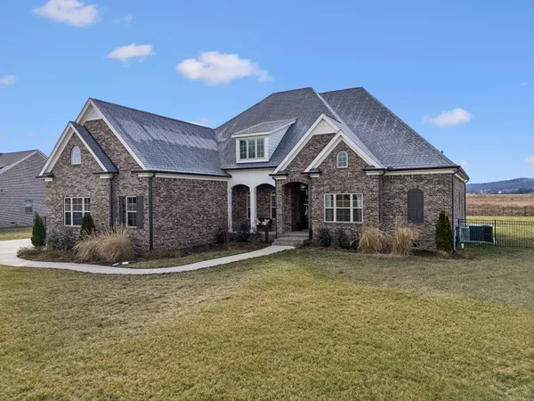 a view of livingroom with furniture and windows