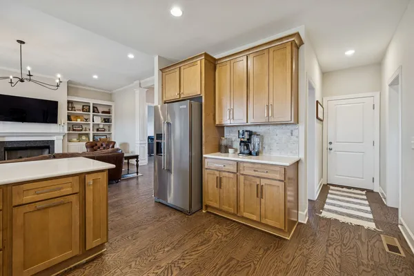 a view of a dining room with furniture and window