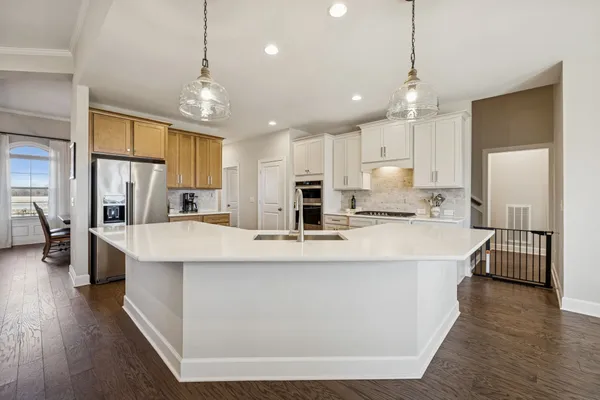 a terrace with a table and chairs