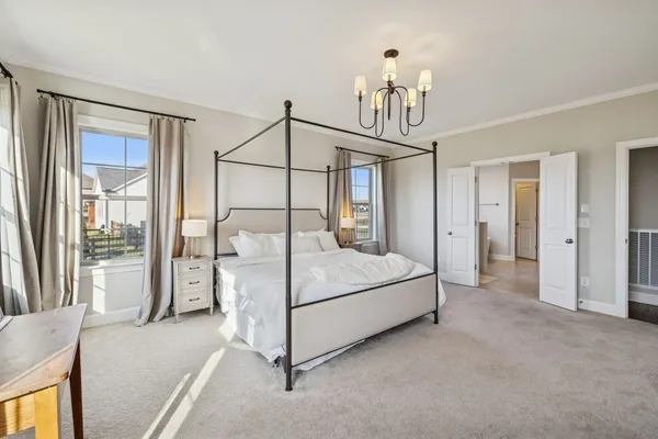 a view of a house with backyard porch and sitting area