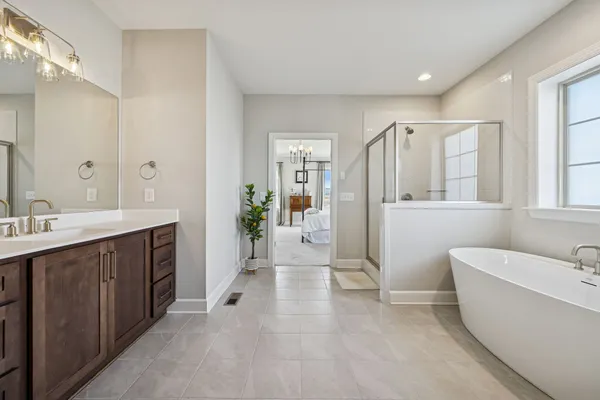 a lobby with furniture and a potted plant