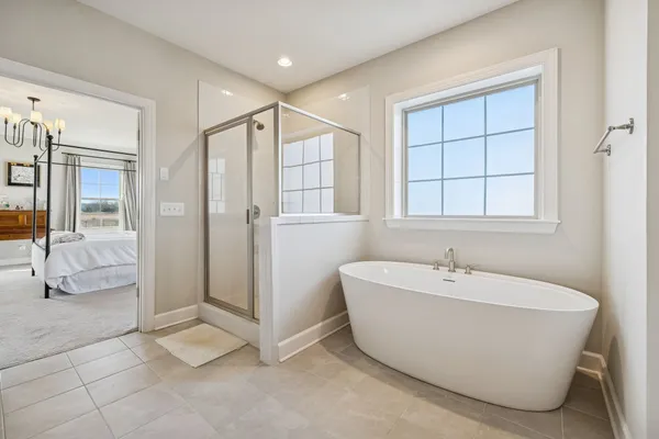 a view of a livingroom with furniture and a window