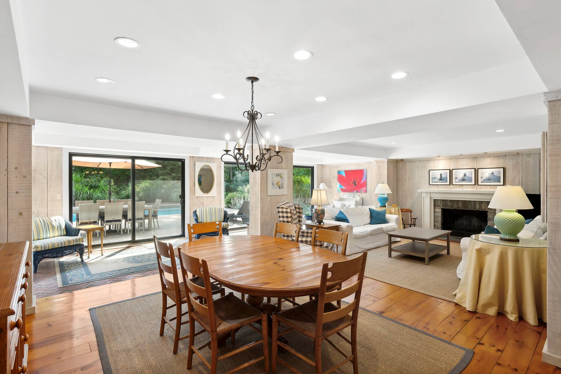 1 Ward Road Shelter Island, NY 11964 - Photo 11 of 17 a view of a dining room with furniture wooden floor and chandelier