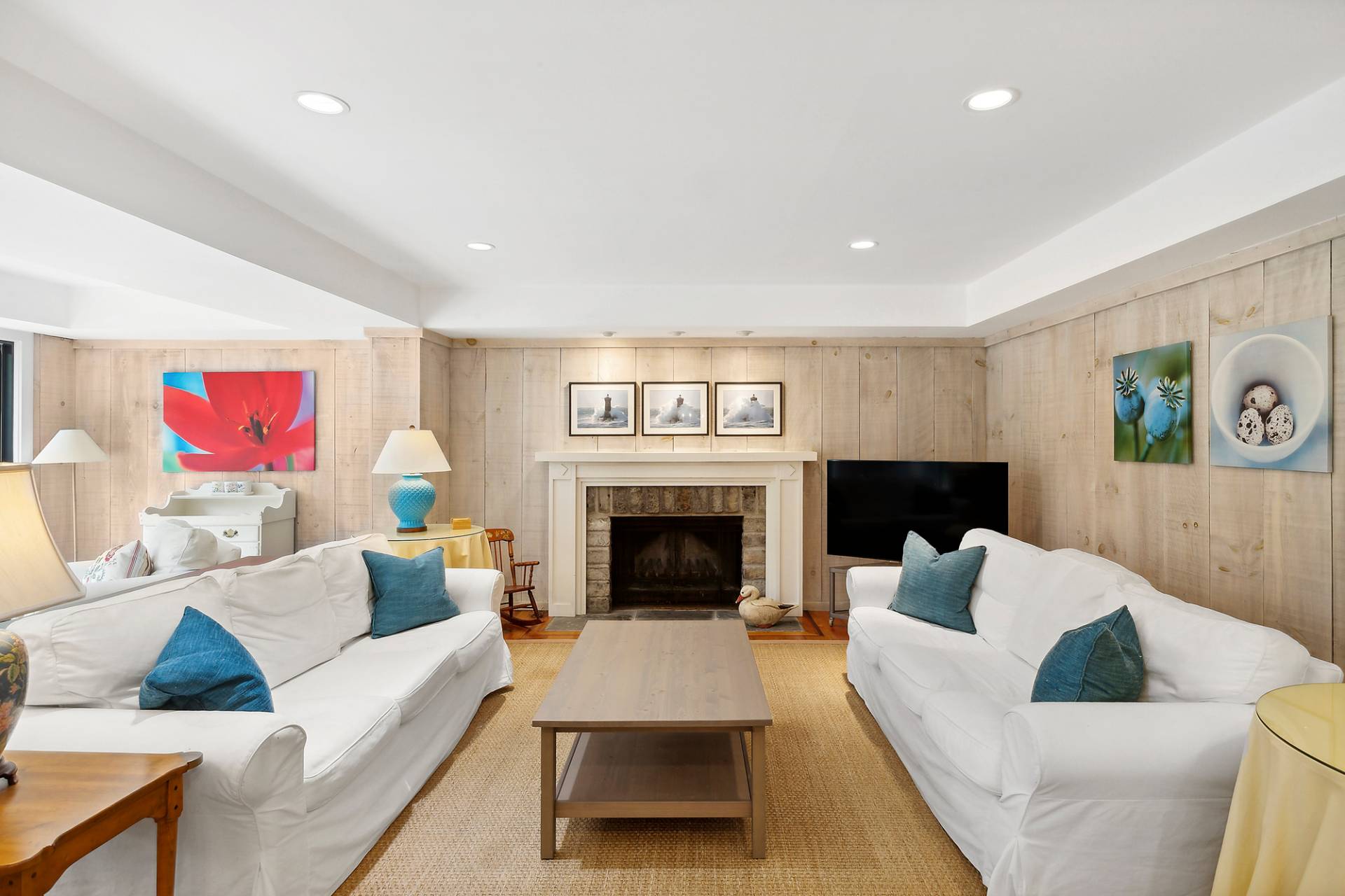 1 Ward Road Shelter Island, NY 11964 - Photo 12 of 17 a living room with furniture and a fireplace