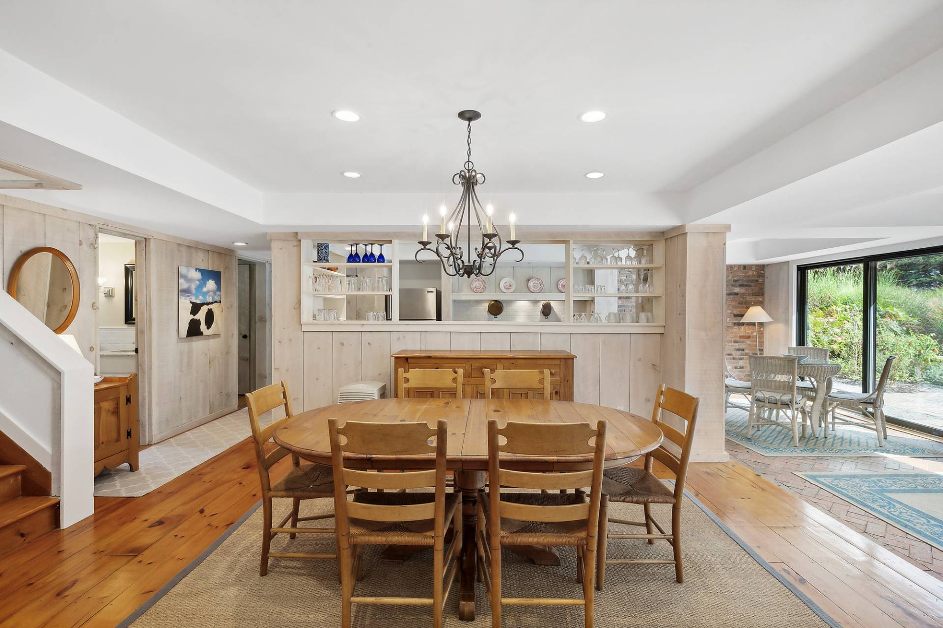 1 Ward Road Shelter Island, NY 11964 - Photo 13 of 17 a view of a dining room with furniture window and wooden floor