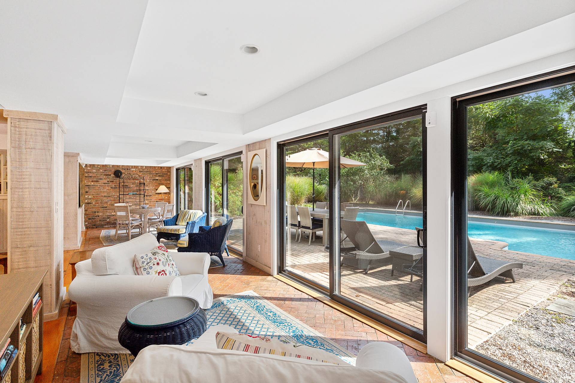 1 Ward Road Shelter Island, NY 11964 - Photo 15 of 17 a living room with furniture and a floor to ceiling window