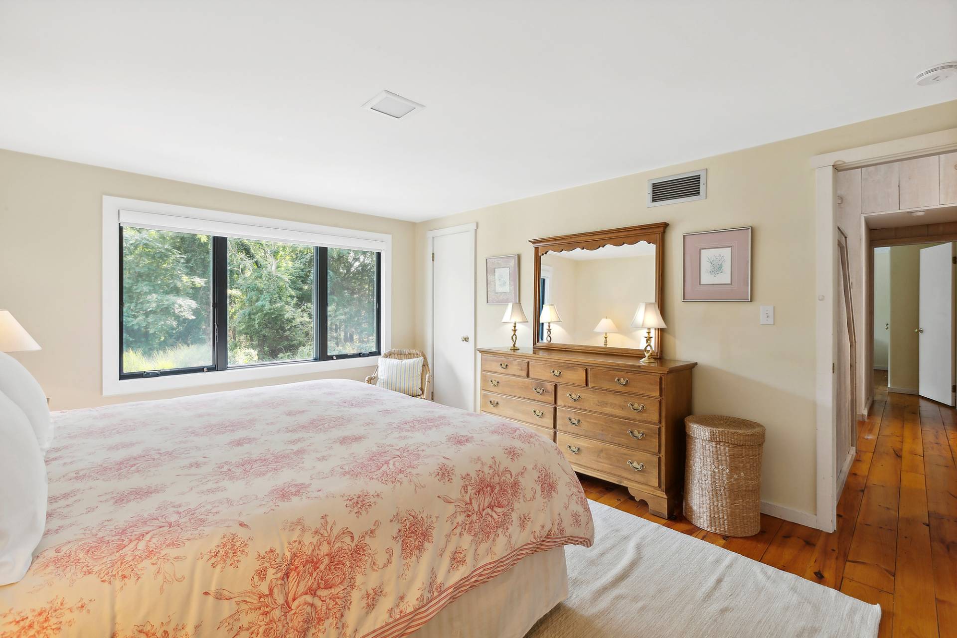 1 Ward Road Shelter Island, NY 11964 - Photo 17 of 17 a bedroom with a bed and wooden floor