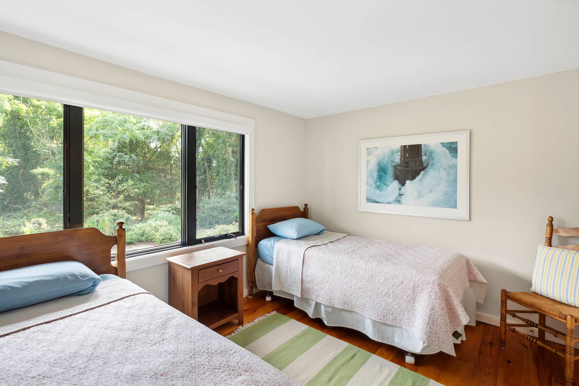 1 Ward Road Shelter Island, NY 11964 - Photo 6 of 17 a bedroom with a bed and a large window