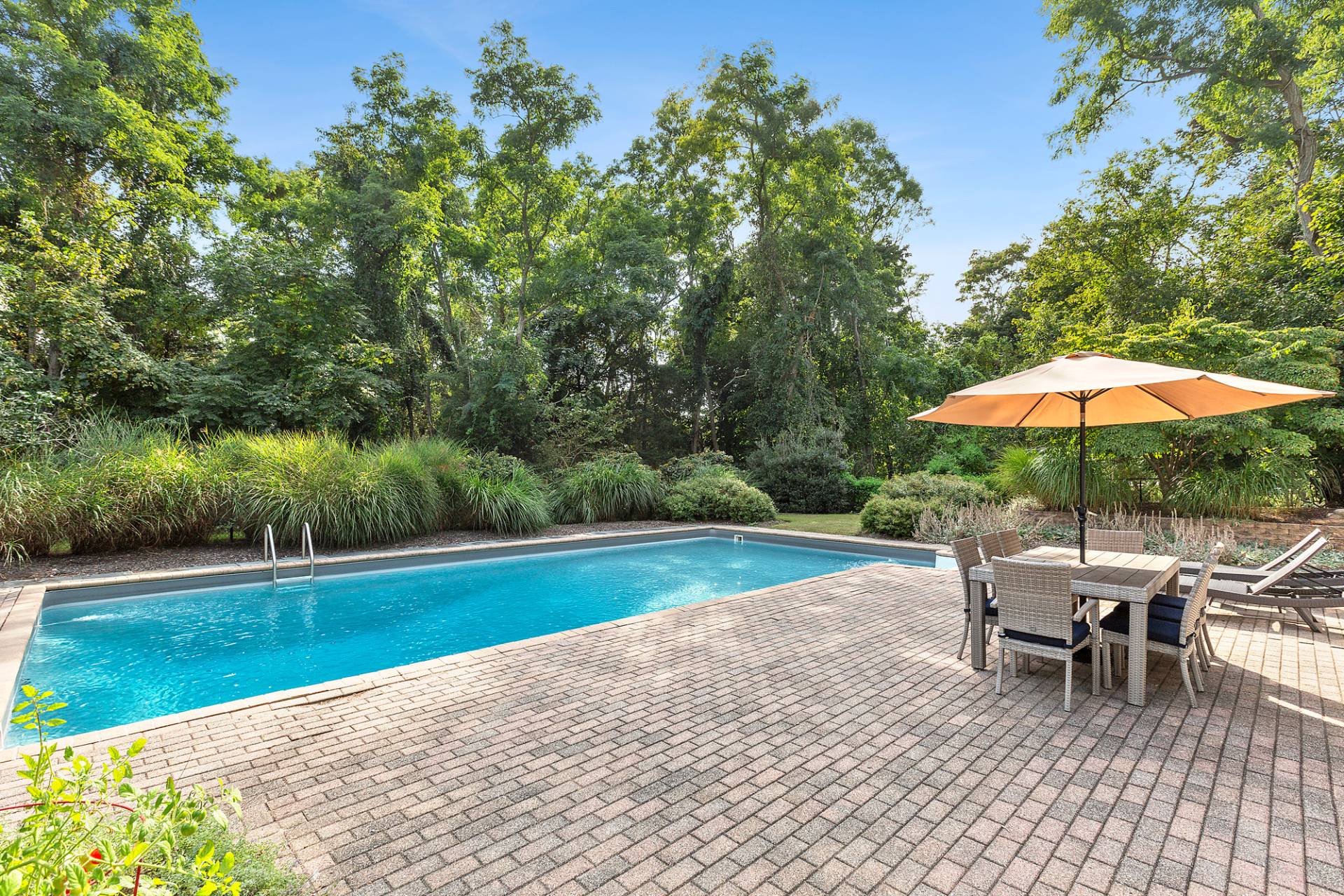 1 Ward Road Shelter Island, NY 11964 - Photo 9 of 17 a backyard view with a seating space
