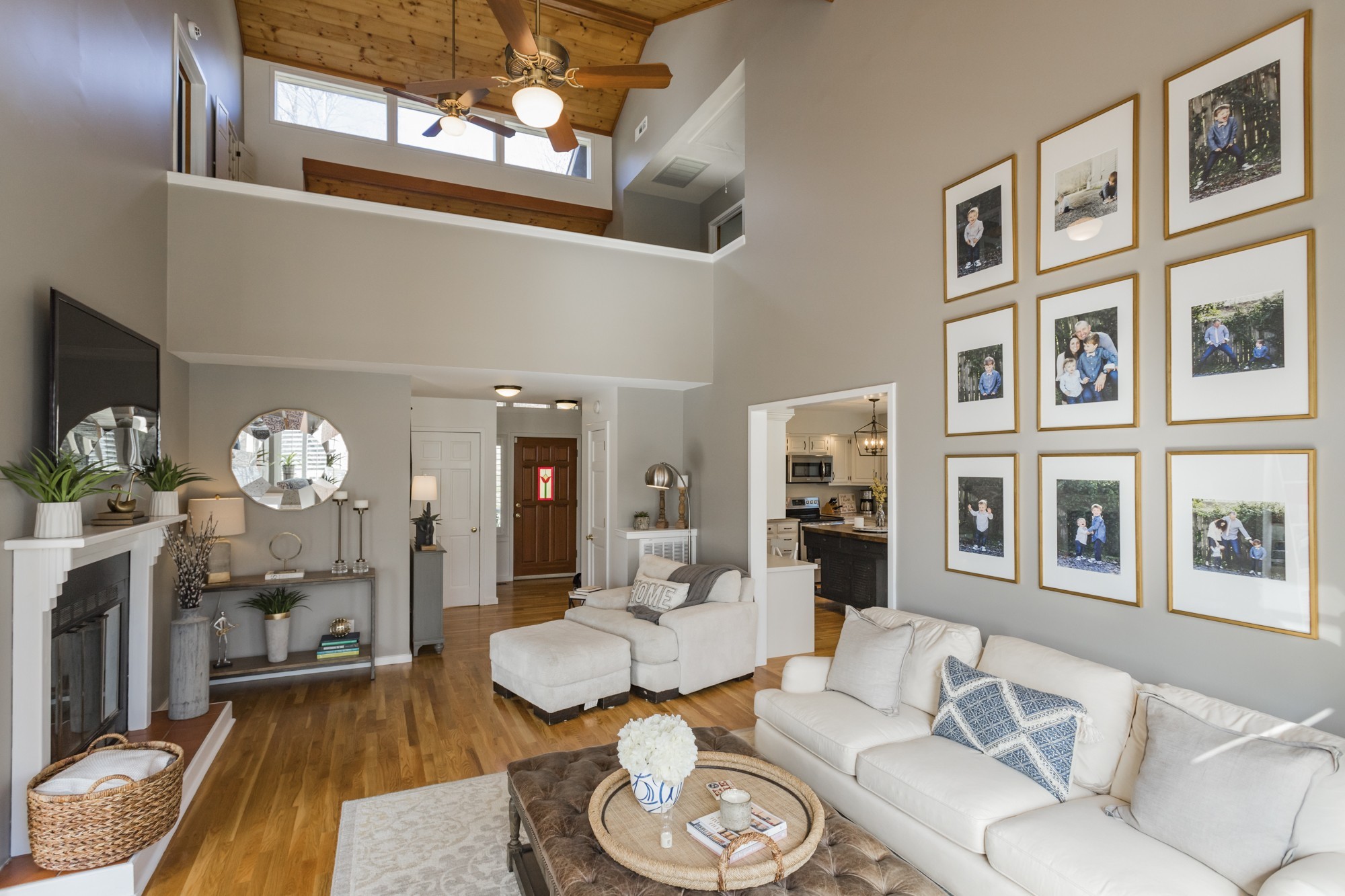 804 High Point Ridge Road Franklin, TN 37069 - Photo 12 of 50 a living room with furniture a chandelier and a dining table