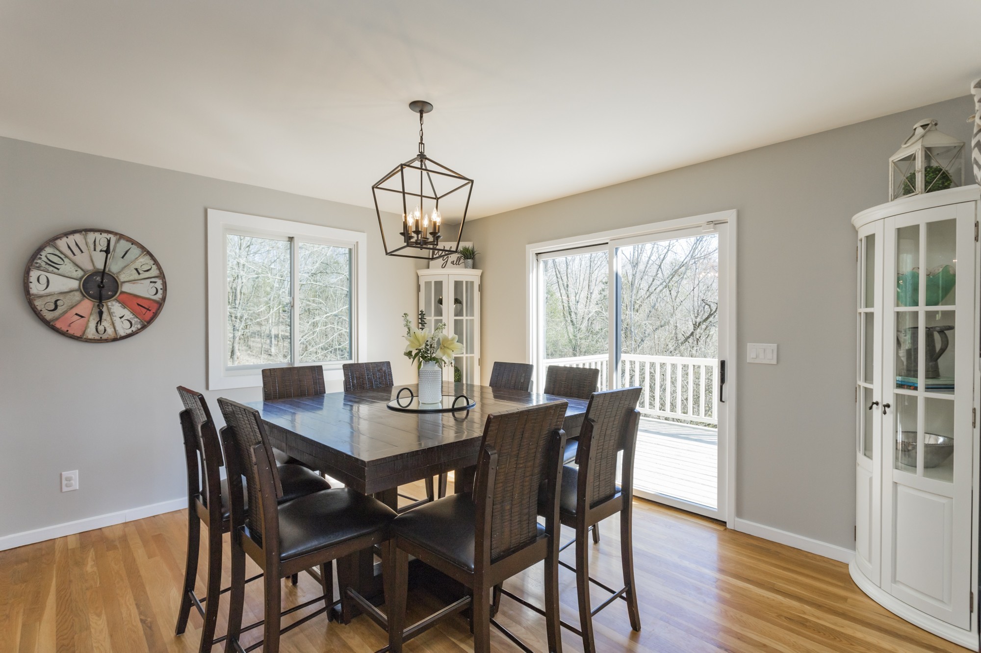 804 High Point Ridge Road Franklin, TN 37069 - Photo 19 of 50 a view of a dining room with furniture a chandelier and wooden floor