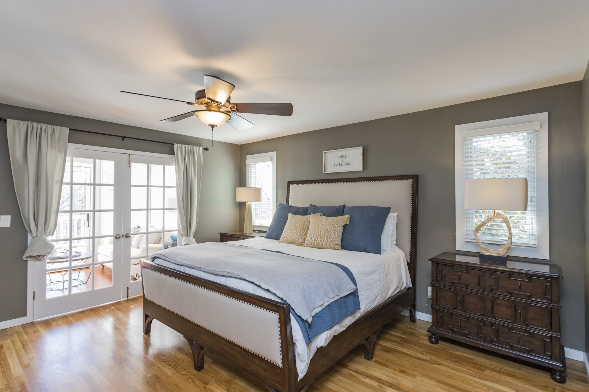 804 High Point Ridge Road Franklin, TN 37069 - Photo 21 of 50 a bedroom with a large bed and a chandelier