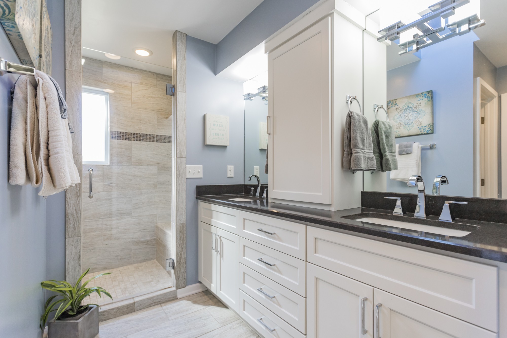 804 High Point Ridge Road Franklin, TN 37069 - Photo 24 of 50 a bathroom with a granite countertop sink a mirror and a shower