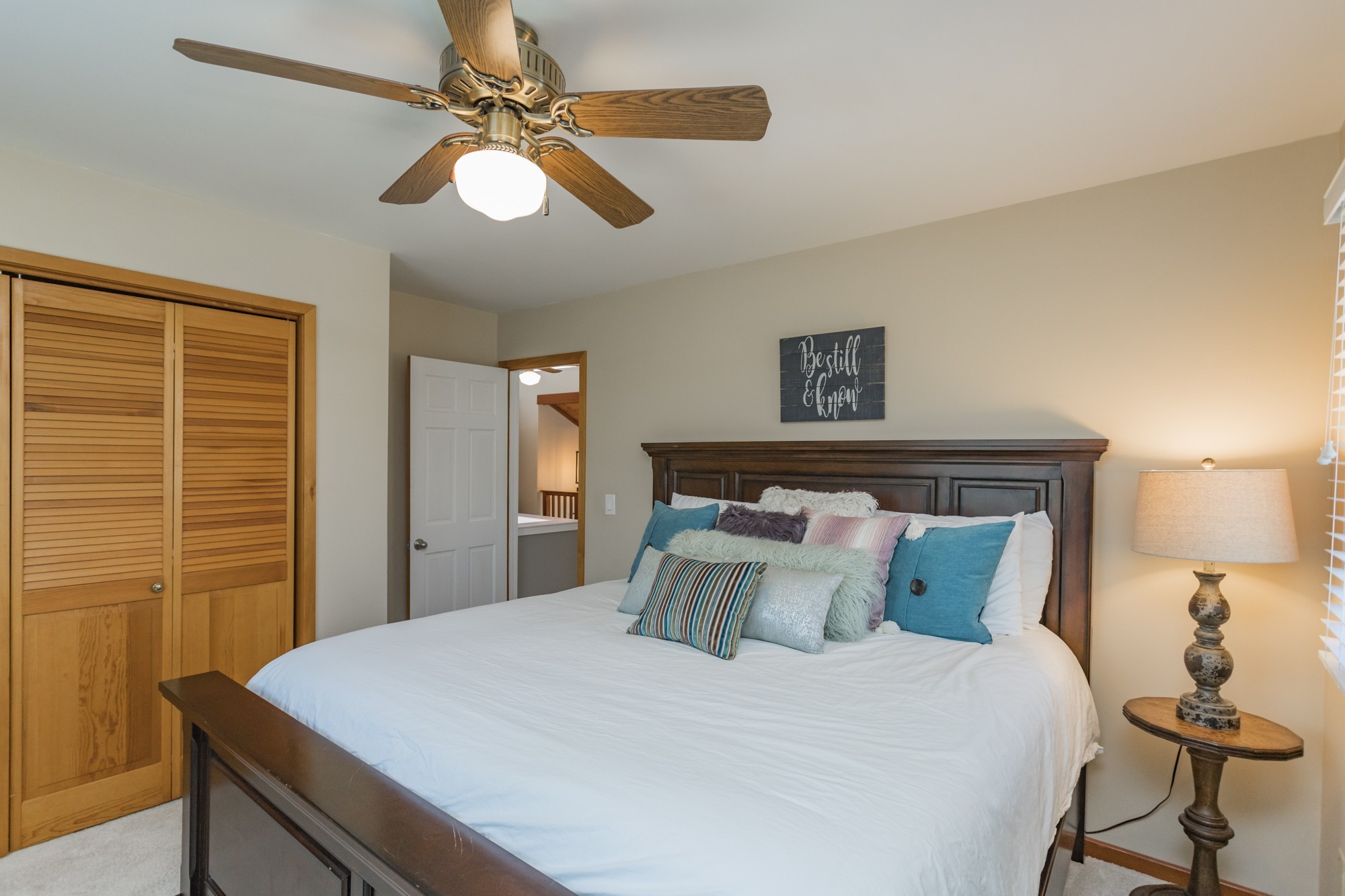 804 High Point Ridge Road Franklin, TN 37069 - Photo 40 of 50 a bedroom with a bed and a chandelier