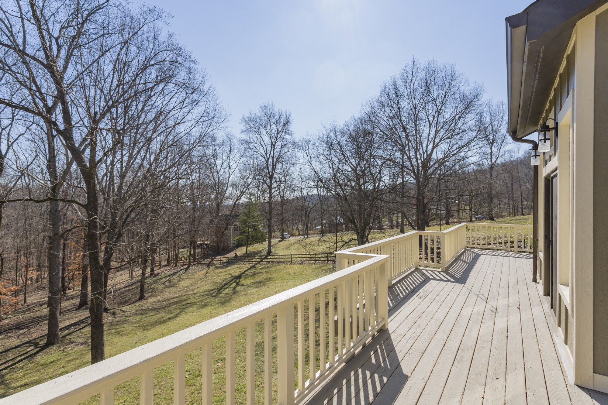 804 High Point Ridge Road Franklin, TN 37069 - Photo 48 of 50 a view of balcony with two chairs and wooden floor