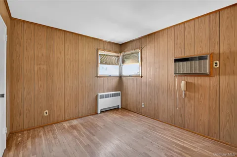 a view of a livingroom with wooden floor