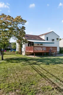 a view of a house with a big yard