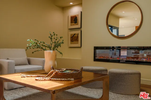 a large kitchen with stainless steel appliances kitchen island granite countertop a sink and cabinets