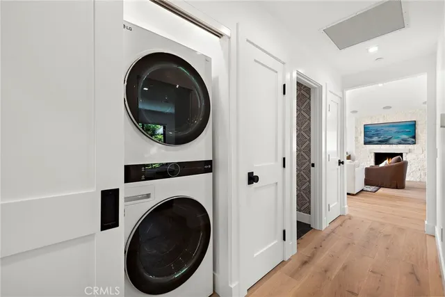 a view of a hallway with washer and dryer