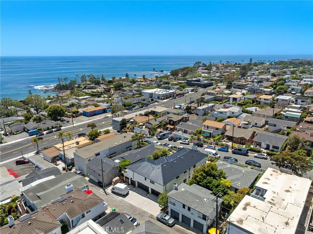 an aerial view of beach and ocean