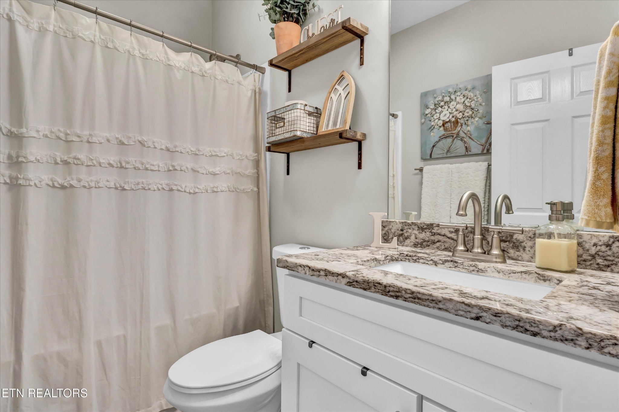 4806 Salem Road Greenback, TN 37742 - Photo 11 of 31 a bathroom with a granite countertop sink and a mirror
