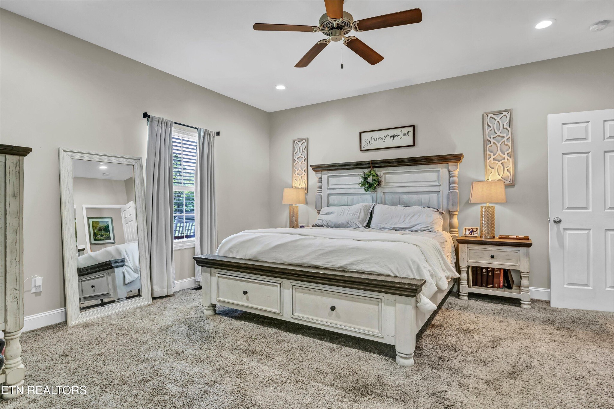 4806 Salem Road Greenback, TN 37742 - Photo 13 of 31 a bedroom with a bed and a chandelier