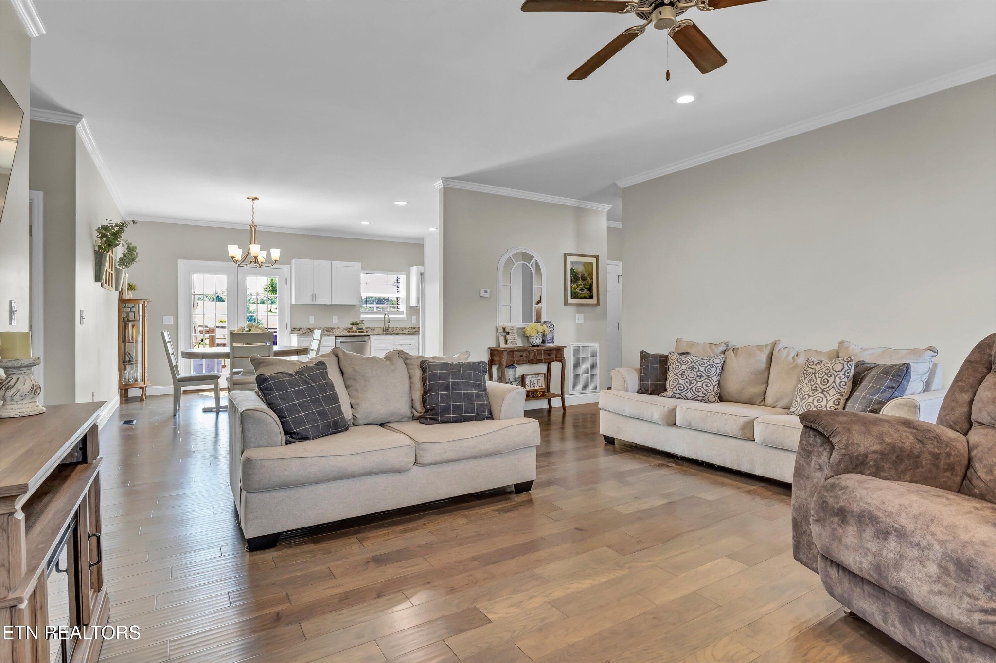 4806 Salem Road Greenback, TN 37742 - Photo 5 of 31 a living room with furniture and a chandelier
