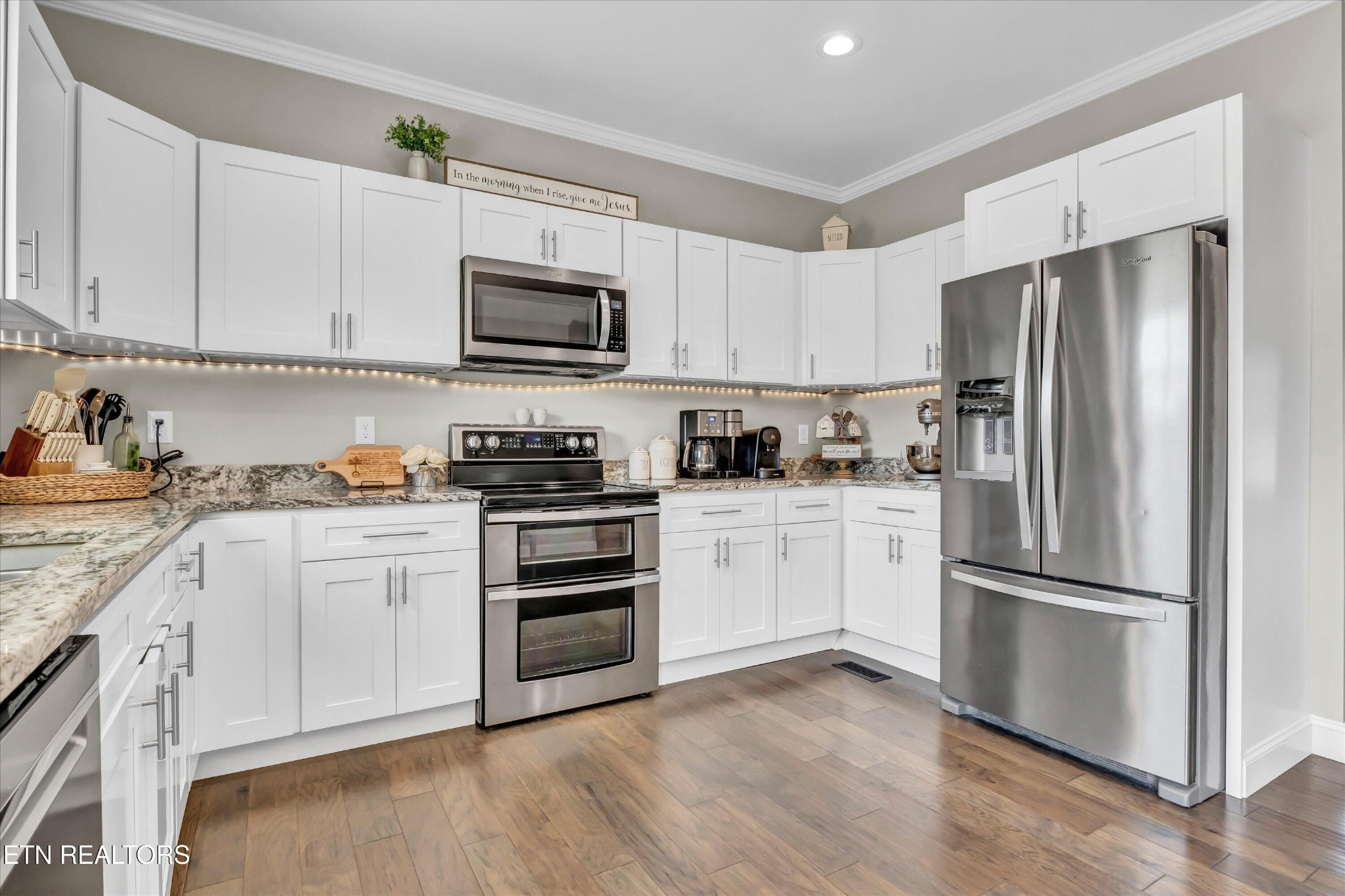 4806 Salem Road Greenback, TN 37742 - Photo 9 of 31 a kitchen with cabinets stainless steel appliances and wooden floor