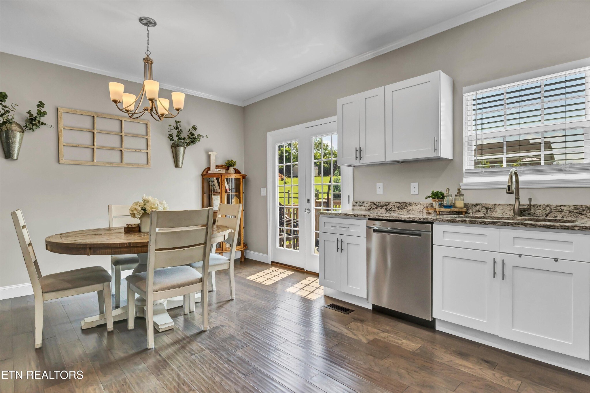 4806 Salem Road Greenback, TN 37742 - Photo 10 of 31 a kitchen that has a table chairs and wooden floor