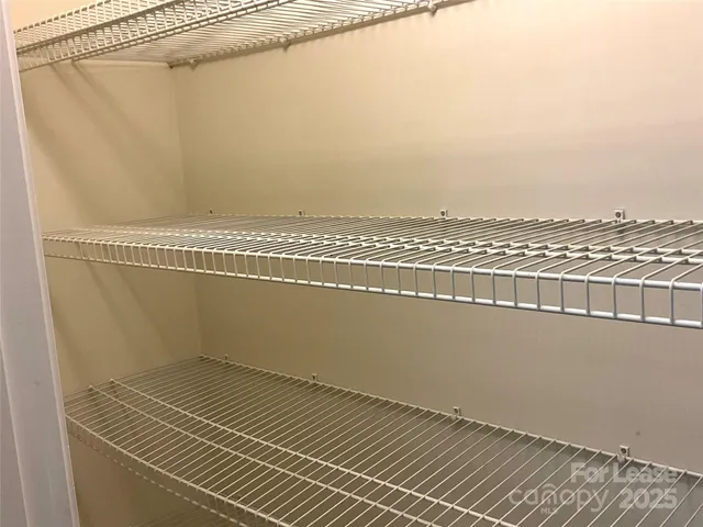 a view of a room with an empty space