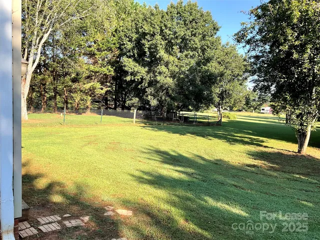 a view of swimming pool with an outdoor space and seating area