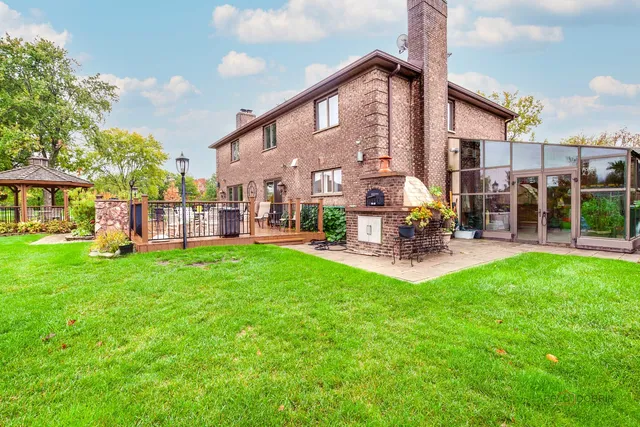 a view of a building with a backyard