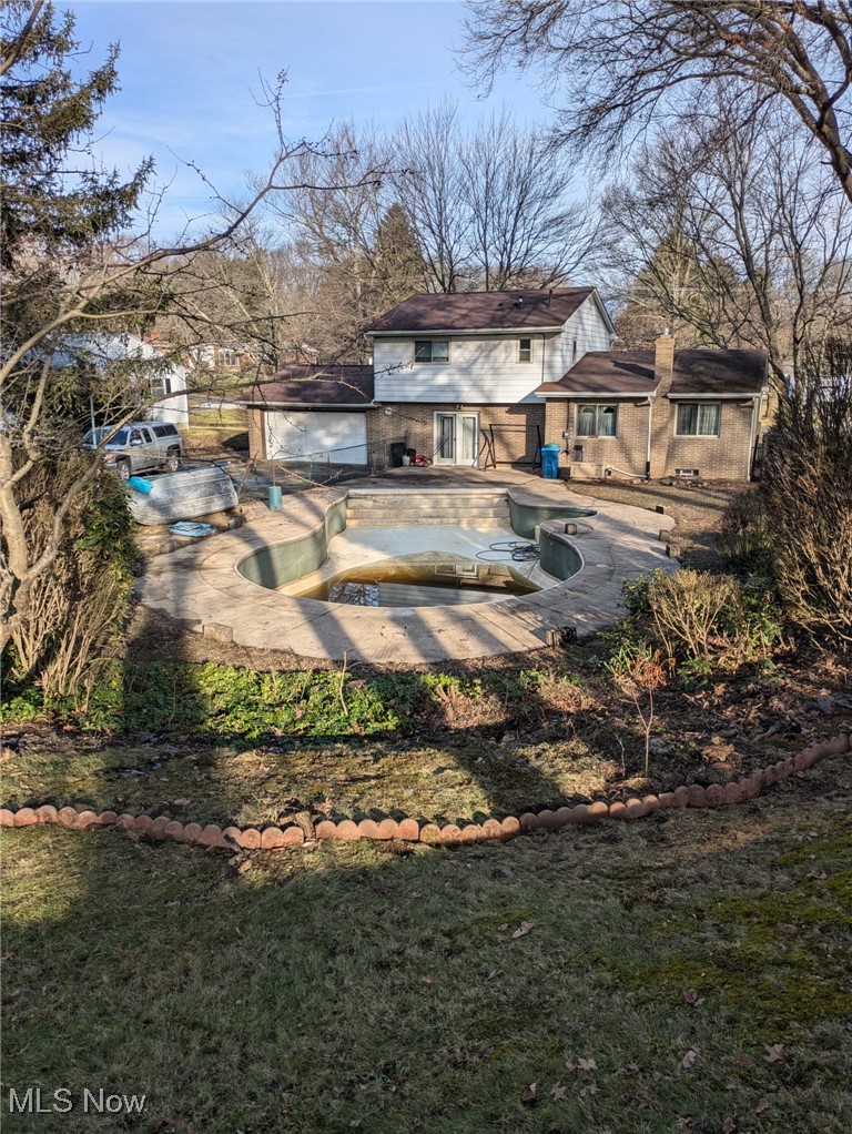 632 Center Road New Franklin, OH 44319 - Photo 25 of 26 Summer photo of pool empty