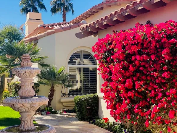 a backyard of a house with seating space