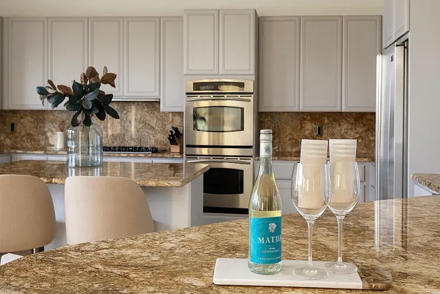 a bathroom with a toilet a sink and a mirror