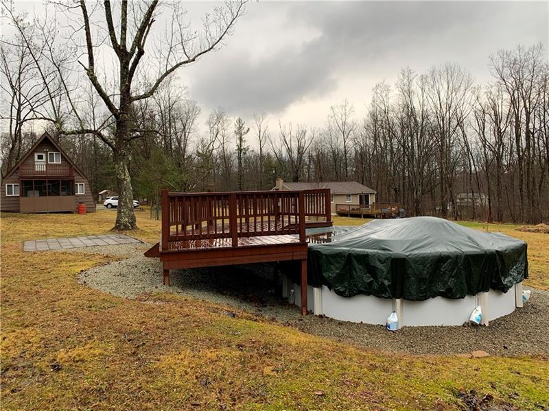 466 Powder Mill Road Rector, PA 15677 - Photo 23 of 25 With just under an acre of property it's easy to enjoy summer fun with your own pool. Outdoor furniture is also included.