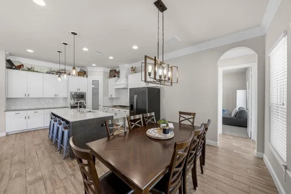 a bedroom with bed and window