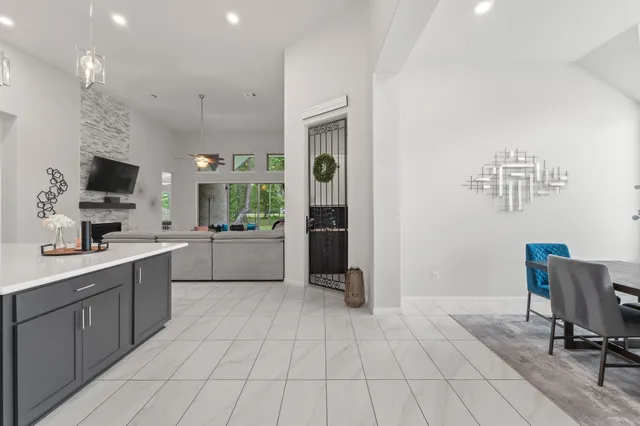 a kitchen with a sink and cabinets