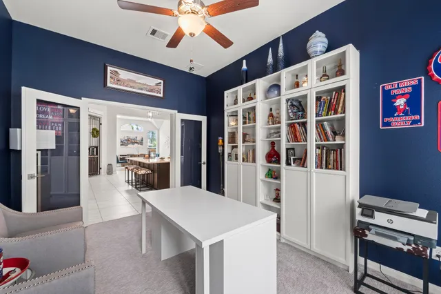 a view of a livingroom with furniture and chandelier