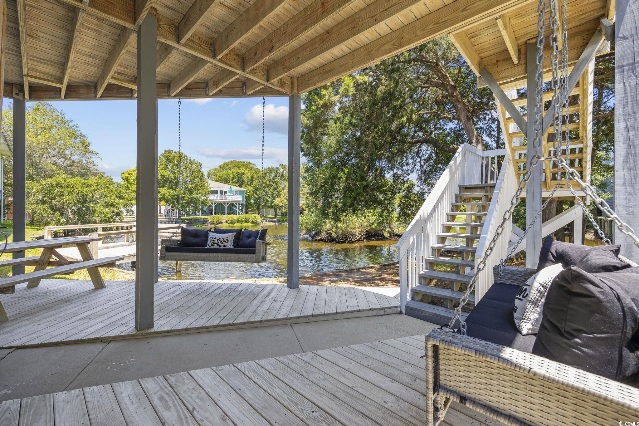222 Calhoun Drive Murrells Inlet, SC 29576 - Photo 27 of 40 Wooden terrace with a water view