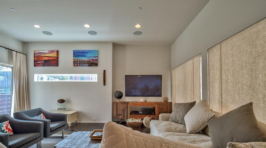 5205 Capitol Avenue, Unit 1 Dallas, TX 75206 - Photo 11 of 39 a living room with furniture and a couch