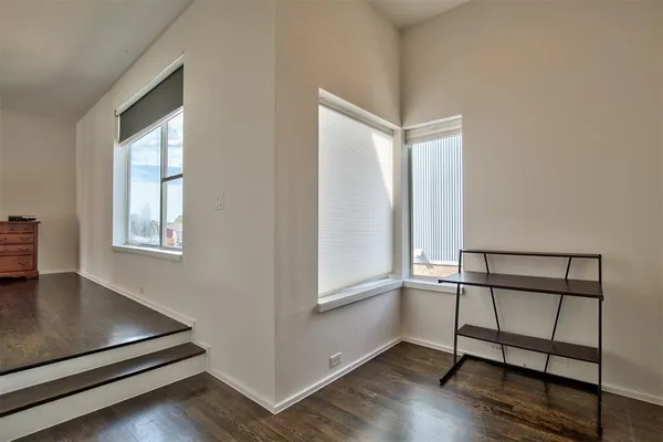 a view of livingroom with furniture and a window
