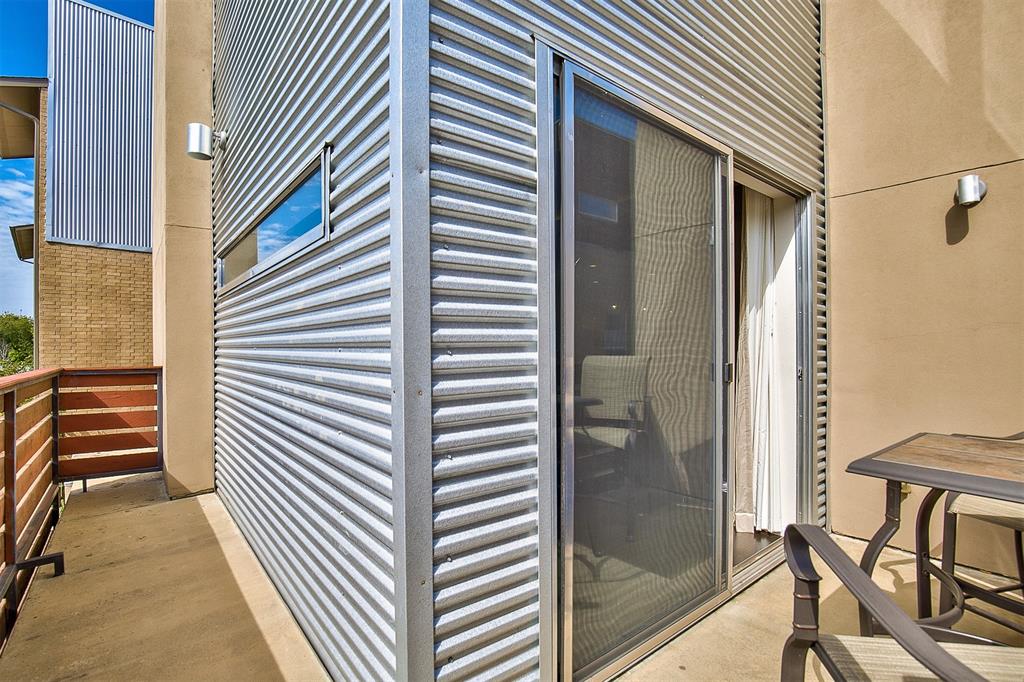 5205 Capitol Avenue, Unit 1 Dallas, TX 75206 - Photo 30 of 39 a view of a balcony with furniture