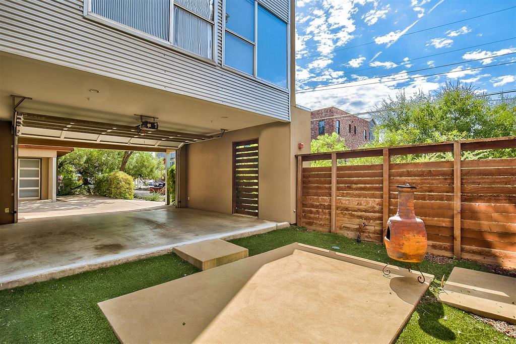5205 Capitol Avenue, Unit 1 Dallas, TX 75206 - Photo 34 of 39 a backyard of a house with garden and outdoor seating