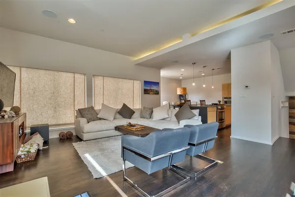 a living room with furniture and a table
