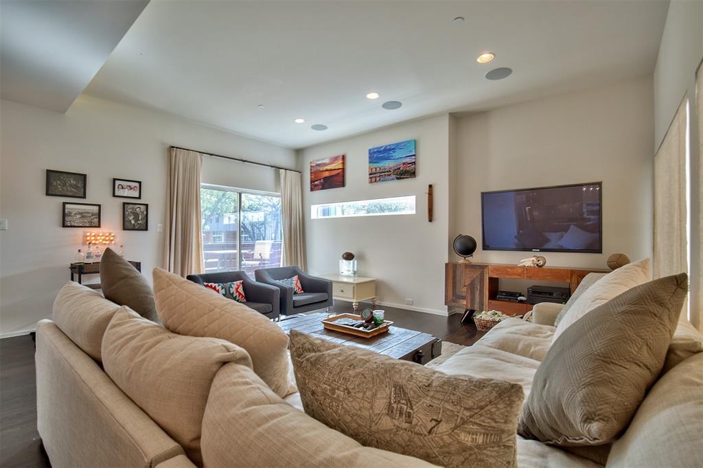 5205 Capitol Avenue, Unit 1 Dallas, TX 75206 - Photo 10 of 39 a living room with furniture and a window