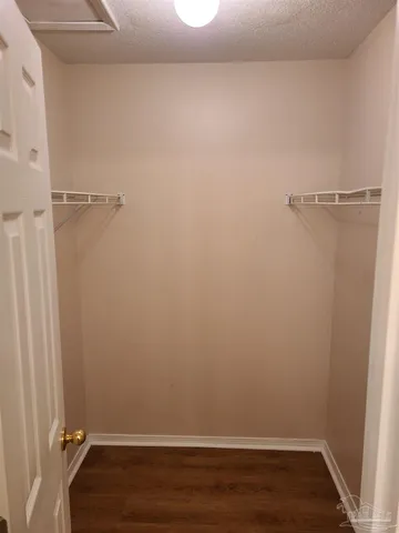 a view of small space with racks on the wall